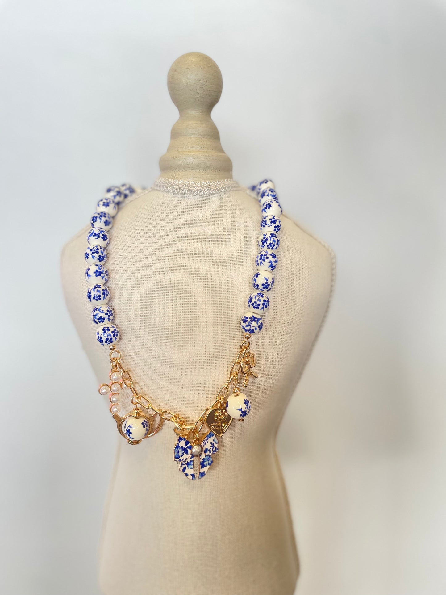 collar ceramica charms